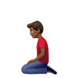 kniender Mann: mitteldunkle Hautfarbe