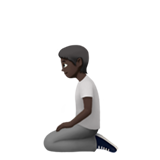 kniende Person: dunkle Hautfarbe