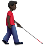 Mann mit Langstock: dunkle Hautfarbe, nach rechts