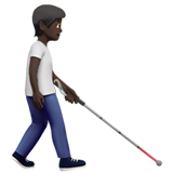 Person mit Langstock: dunkle Hautfarbe, nach rechts