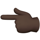nach links weisender Zeigefinger: dunkle Hautfarbe