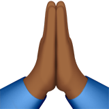 zusammengelegte Handflächen: mitteldunkle Hautfarbe